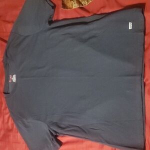 Dark blue size medium Levi's T shirt never worn.